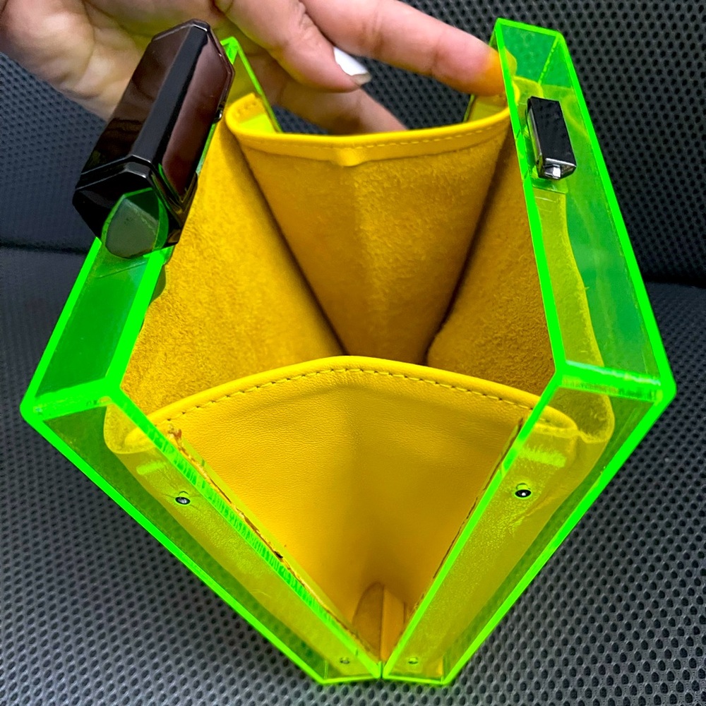 Neon French Connection Plexiglass square clutch.